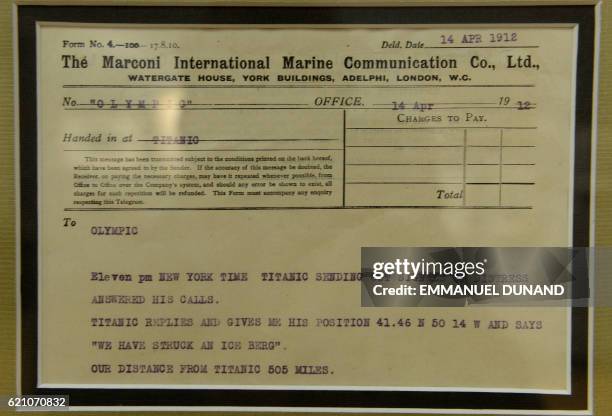 Marconi message from the Titanic to the Olympic ship is on display at Bonhams auction house in New York, April 12, 2012. Bonhams is scheduled to hold...