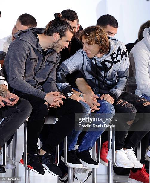 Gareth Bale and Luka Modric of Real Madrid chat during a promotional event by the German carmaker Audi at Carlos Sainz Center on November 4, 2016 in...