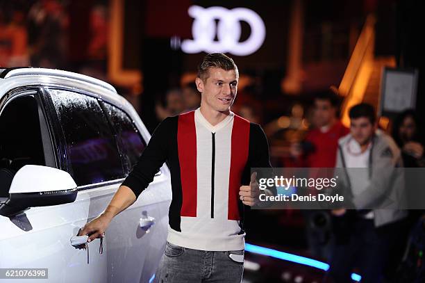 Toni Kroos of Real Madrid smiles before getting into his new Audi car for the 2016/2017 season at Carlos Sainz Center on November 4, 2016 in Madrid,...