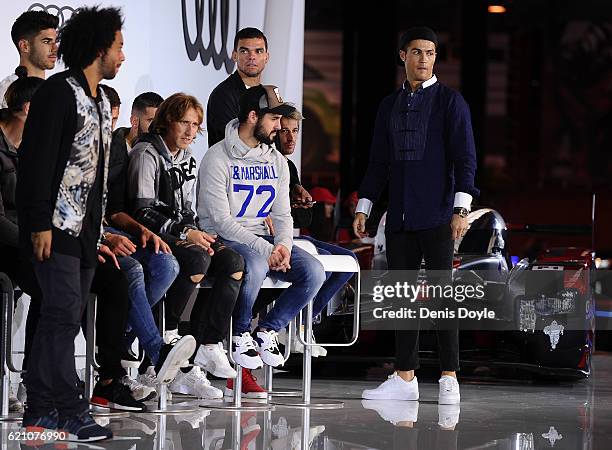 Cristiano Ronaldo of Real Madrid looks on with teammates during a promotional event for the German carmaker Audi at Carlos Sainz Center on November...