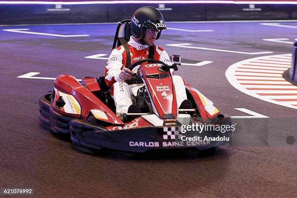 Sergio Ramos of Real Madrid drives a mini car during a promotion event in Madrid on November 4, 2016. Audi gave the Real Madrid players their new...