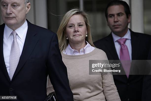 Bridget Anne Kelly, former deputy chief of staff for New Jersey Governor Chris Christie, left, exits federal court with attorney Michael Critchley,...
