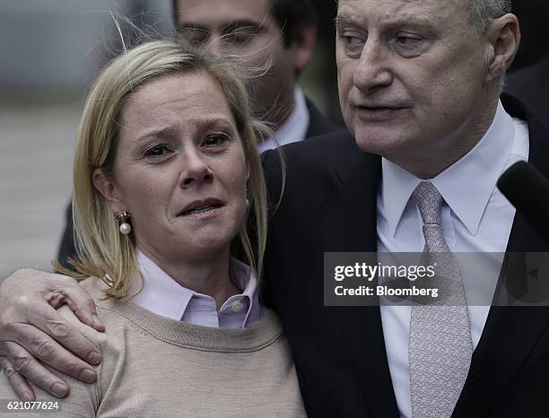 Bridget Anne Kelly, former deputy chief of staff for New Jersey Governor Chris Christie, left, reacts as attorney Michael Critchley speaks to members...