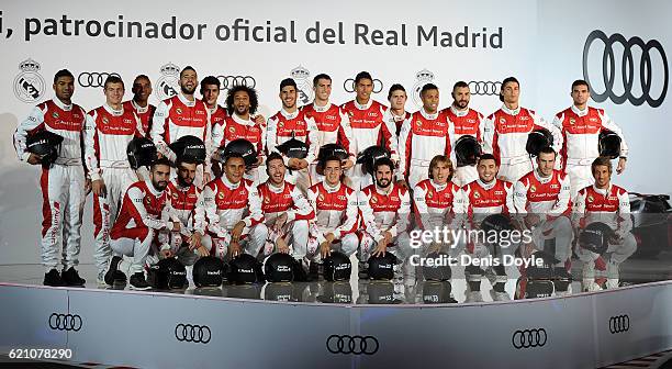 Real Madrid players pose for a photograph during a promotional event for the German carmaker Audi at Carlos Sainz Center on November 4, 2016 in...