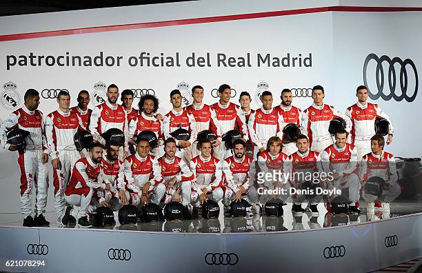 Real Madrid players pose for a photograph during a promotional event for the German carmaker Audi at Carlos Sainz Center on November 4, 2016 in...