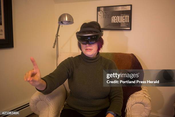 Dr. R. Aileen Yingst, Senior Scientist at the Planetary Sciences Institute, uses a HoloLens, virtual reality tool that helps her see Mars, at her...