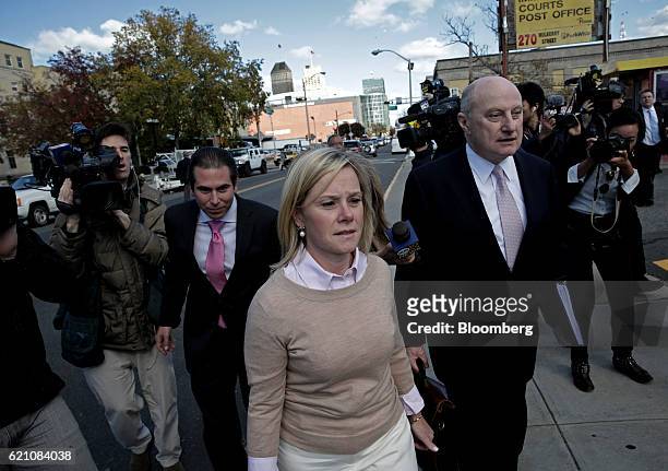 Bridget Anne Kelly, former deputy chief of staff for New Jersey Governor Chris Christie, left, exits federal court with attorney Michael Critchley in...