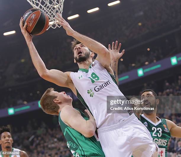 Furkan Aldemir, #19 of Darussafaka Dogus Istanbul competes with Brock Motum, #12 of Zalgiris Kaunas in action during the 2016/2017 Turkish Airlines...