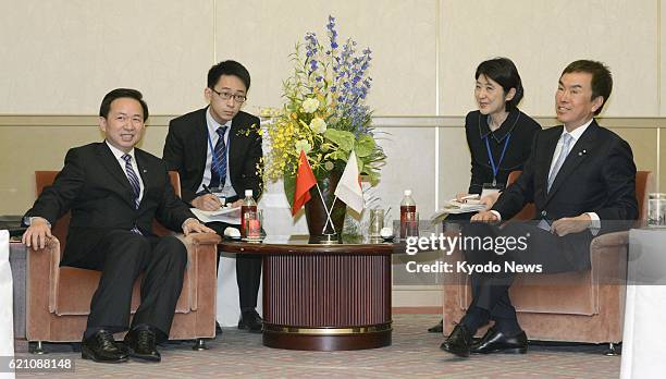 Japan - China's vice minister for environmental protection Li Ganjie and Japanese Environment Minister Nobuteru Ishihara hold talks at a hotel in...