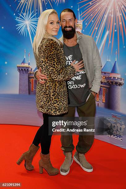 Janine Kunze and partner Dirk Budach attend the premiere of 'Disney on Ice - 100 Jahre voller Zauber' at Lanxess Arena on November 4, 2016 in...