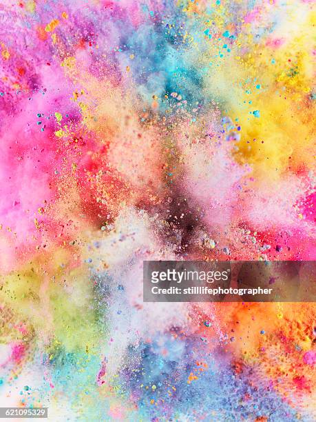 colorful powder explosion - color stockfoto's en -beelden
