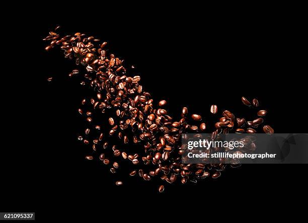 coffee bean on the air - grão de café tostado imagens e fotografias de stock