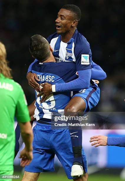 Salomon KalouBERLIN, GERMANY Salomon Kalou of Berlin jubilates with team mate Vedad Ibisevic after scoring the first goal during the Bundesliga match...