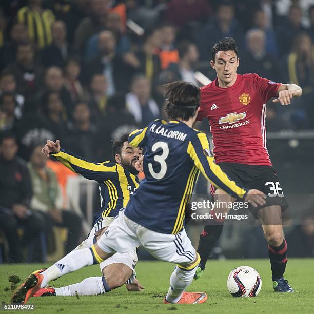 Volkan Sen of Fenerbahce, Hasan Ali Kaldirim of Fenerbahce, Matteo Darmian of Manchester United FCuring the UEFA Europa Leaguegroup A match between...