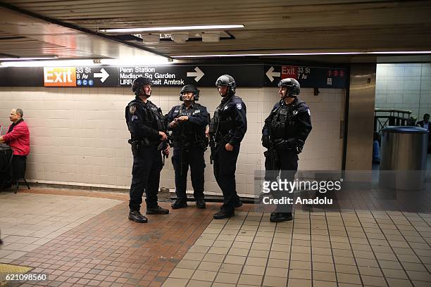 New York Police Department units patrol at Pennsylvania station as part of security measures in Manhattan borough of New York on November 4, 2016.