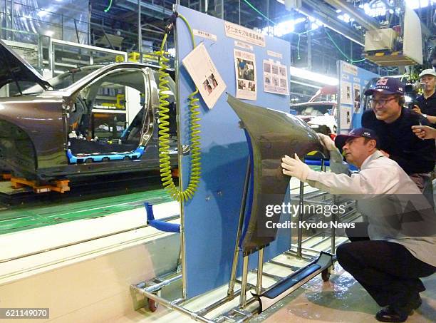 Japan - Nissan Motor Co. CEO Carlos Ghosn visits the company's factory in the town of Kaminokawa, Tochigi Prefecture, on May 14, 2013.