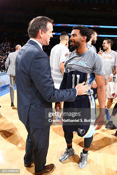 Jeff Hornacek of the New York Knicks talks to Mike Conley of the Memphis Grizzlies after the game on October 29, 2016 at Madison Square Garden in New...