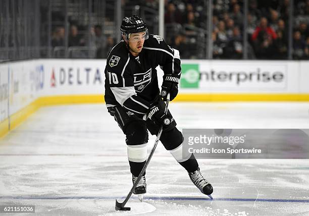 Los Angeles Kings Right Wing Devin Setoguchi brings the puck up the ice during an NHL game between the Pittsburgh Penguins and the Los Angeles Kings...