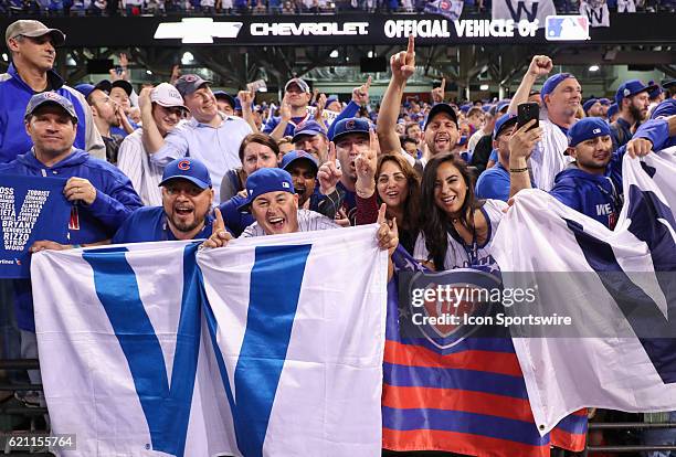 Chicago Cub fans celebrate after winning game 7 of the 2016 World Series against the Chicago Cubs and the Cleveland Indians at Progressive Field in...