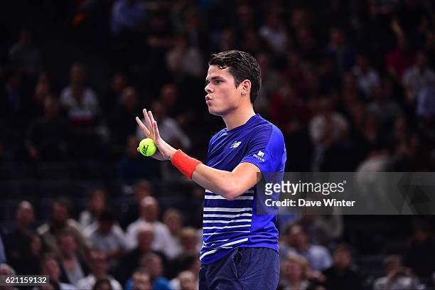 Milos Raonic of Canada apologises after hitting a fan with a serve during the Mens Singles quarter final match on day five of the BNP Paribas Masters...
