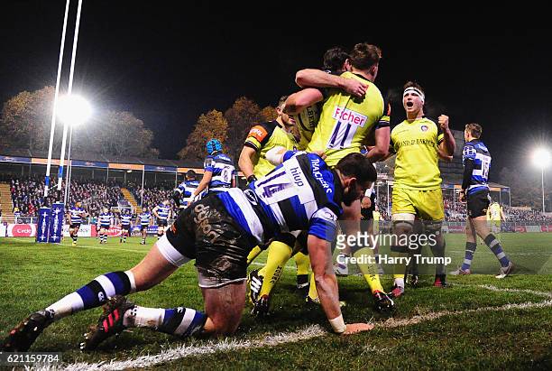 George Catchpole of Leicester Tigers scores and celebrates his sides second try during the Anglo-Welsh Cup match between Bath Rugby and Leicester...