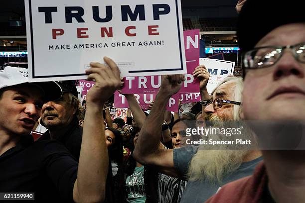 Supporters wait for Donald Trump to speak at a rally on November 4, 2016 in Hershey, Pennsylvania. Days before the presidential election, both...