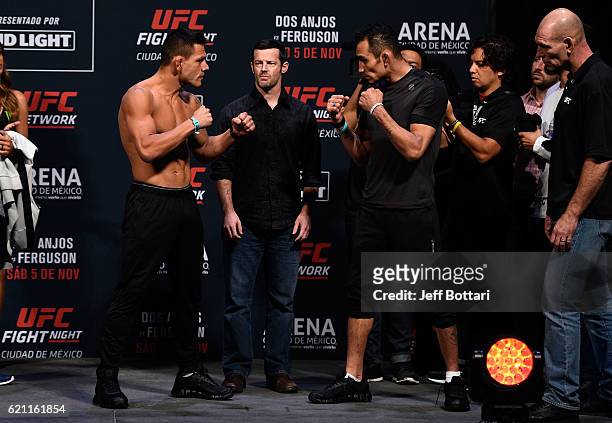 Rafael dos Anjos of Brazil and Tony Ferguson of the United States face off during the UFC weigh-in at the Arena Ciudad de Mexico on November 4, 2016...