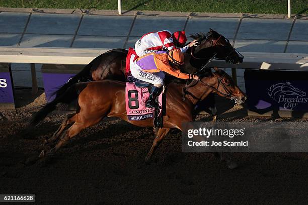 Beholder ridden by jockey Gary Stevens wins in the Longines Breeders' Cup Distaff during day one of the 2016 Breeders' Cup World Championships at...