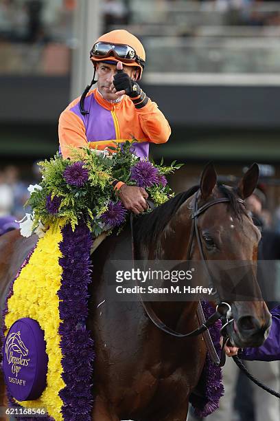 Jockey Gary Stevens riding Beholder celebrates after winning in the Longines Breeders' Cup Distaff during day one of the 2016 Breeders' Cup World...