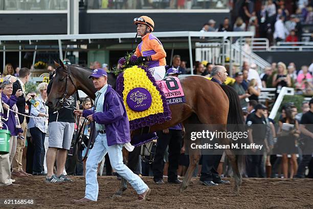 Jockey Gary Stevens riding Beholder celebrates after winning in the Longines Breeders' Cup Distaff during day one of the 2016 Breeders' Cup World...