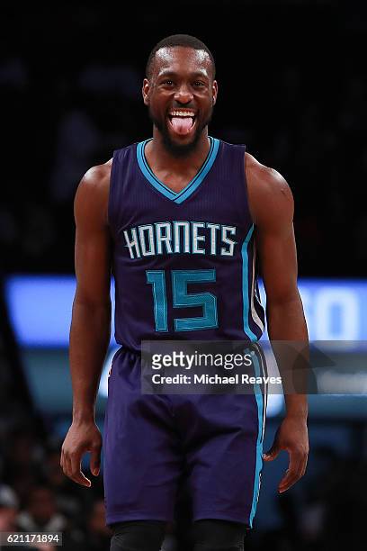 Kemba Walker of the Charlotte Hornets reacts after hitting a shot against the Brooklyn Nets during the second half at Barclays Center on November 4,...