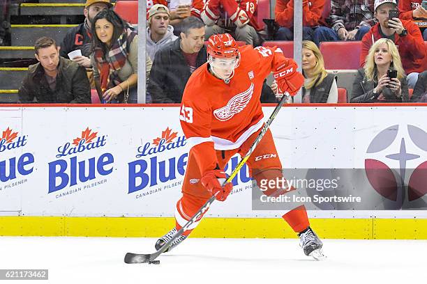 Detroit Red Wings defenseman Alexey Marchenko takes a slap shot from the point during the NHL hockey game between the Winnipeg Jets and Detroit Red...