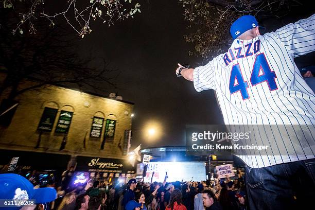 Chicago Cubs fans celebrate outside Wrigley Field after the Cubs defeated the Cleveland Indians in game seven of the 2016 World Series on November 2,...