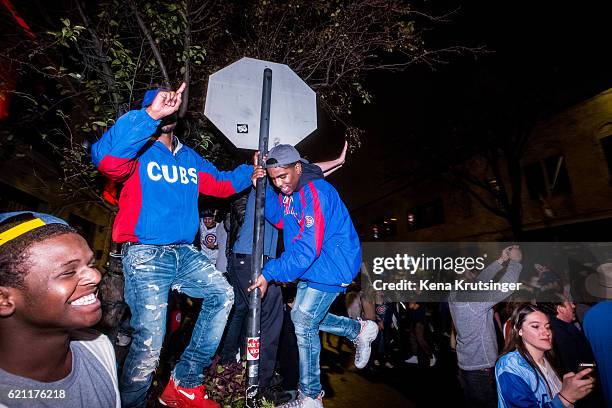 Chicago Cubs fans celebrate outside Wrigley Field after the Cubs defeated the Cleveland Indians in game seven of the 2016 World Series on November 2,...