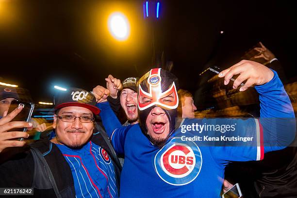 Chicago Cubs fans celebrate outside Wrigley Field after the Cubs defeated the Cleveland Indians in game seven of the 2016 World Series on November 2,...