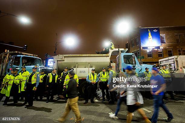 Chicago Cubs fans celebrate outside Wrigley Field after the Cubs defeated the Cleveland Indians in game seven of the 2016 World Series on November 2,...