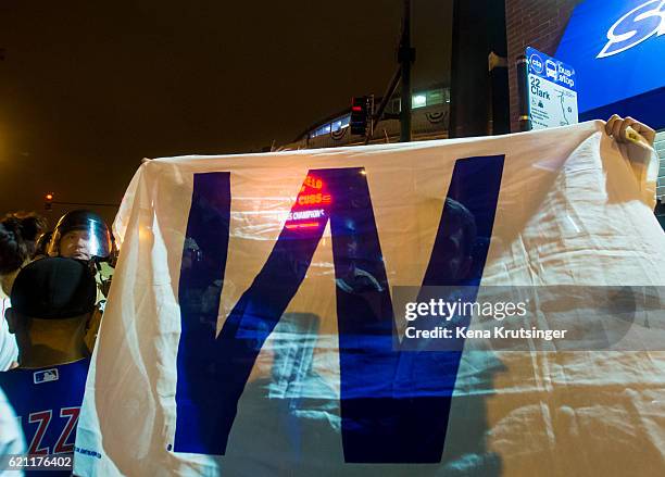 Chicago Cubs fans celebrate outside Wrigley Field after the Cubs defeated the Cleveland Indians in game seven of the 2016 World Series on November 2,...