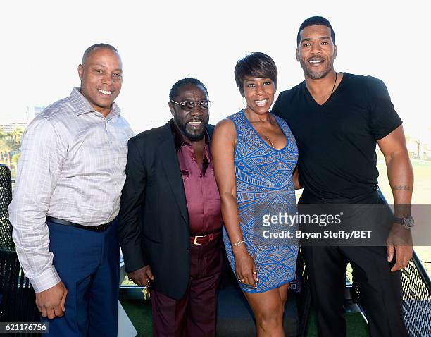 Journalist Jay Harris, singer Eddie Levert, actress Dawnn Lewis, and former NBA player Jimmy Jackson attend "Soul Lunch & Greens: A Charity Golf...