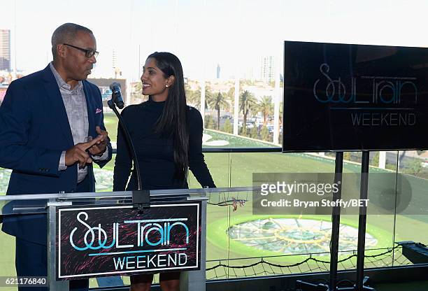 Journalist Jay Harris and professional golfer/fashionista Seema Sadekar speak during "Soul Lunch & Greens: A Charity Golf Experience" at Top Golf at...