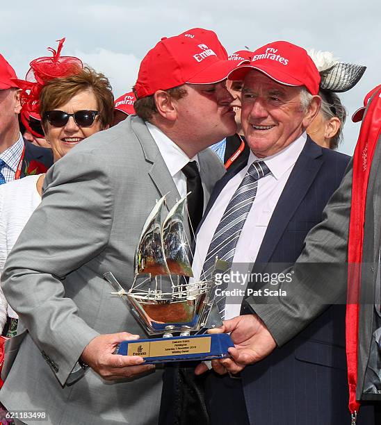 Troy Corstens with Leon Corstens after winning Emirates Stakes at Flemington Racecourse on November 05, 2016 in Flemington, Australia.