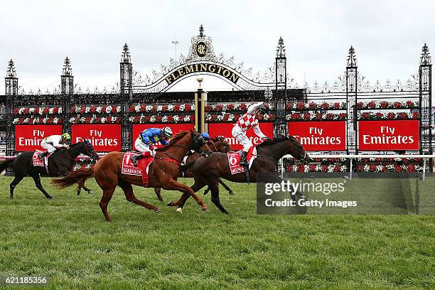 Stephen Baster rides Awesome Rock to win race 7, the Emirates Stakes on Stakes Day at Flemington Racecourse on November 5, 2016 in Melbourne,...