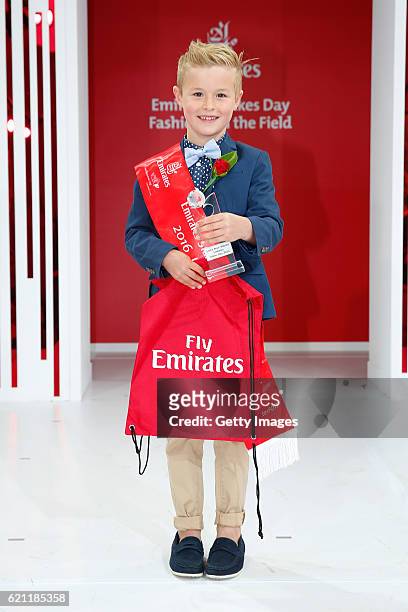 Emirates Fashions on the Field Junior Boys competition winner Billy White, age 7, poses on Emirates Stakes Day at Flemington Racecourse on November...
