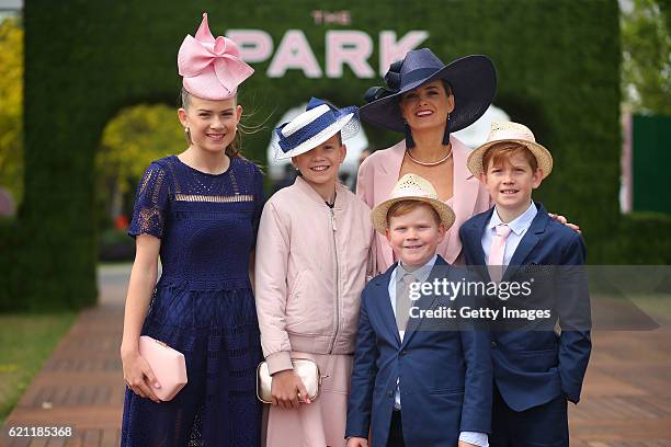 Young racegoers enjoy the atmosphere on Emirates Stakes Day at Flemington Racecourse on November 5, 2016 in Melbourne, Australia.