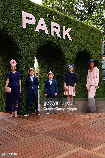 Young racegoers enjoy the atmosphere on Emirates Stakes Day at Flemington Racecourse on November 5, 2016 in Melbourne, Australia.