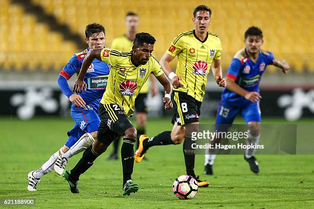 Roy Krishna of the Phoenix beats the challenge of Wayne Brown of the Jets during the round five A-League match between the Wellington Phoenix and the...