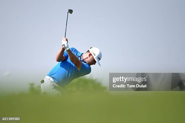 Garrick Porteous of England hits an approach shot during day four of the NBO Golf Classic Grand Final at Al Mouj Golf on November 5, 2016 in Muscat,...