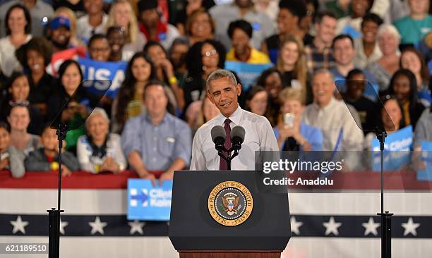 President Barack Obama gestures as he is giving a speech during a presidential election campaign rally, supporting Democrat Party's Presidential...