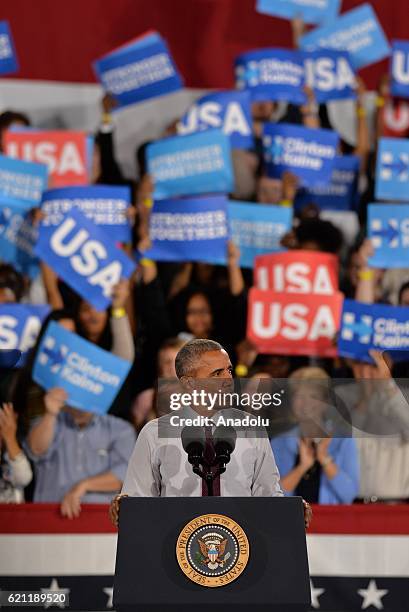 President Barack Obama gestures as he is giving a speech during a presidential election campaign rally, supporting Democrat Party's Presidential...