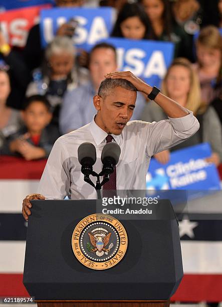 President Barack Obama gestures as he is giving a speech during a presidential election campaign rally, supporting Democrat Party's Presidential...