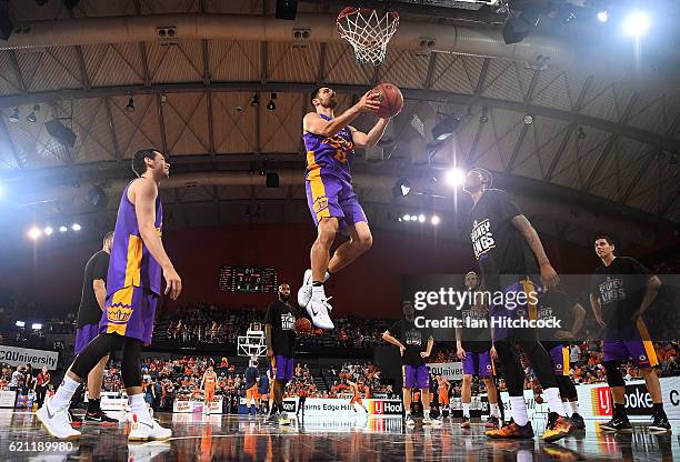 Kevin Lisch of the Kings practices a lay up during the warm before the start of the round five NBL match between the Cairns Taipans and the Sydney...